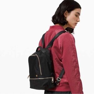 lululemon mini athletica Black Backpack. Gold accents. Rare!